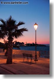benches, dusk, europe, italy, palms, puglia, seawall, sunsets, trani, trees, vertical, photograph
