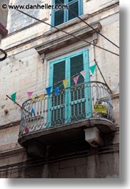 balconies, europe, flags, italy, puglia, trani, vertical, windows, photograph