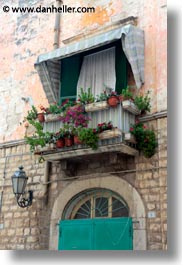 balconies, europe, italy, plants, puglia, trani, vertical, windows, photograph