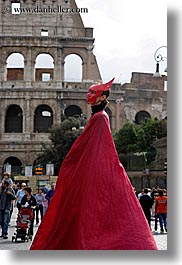 architectural ruins, archways, buildings, colors, colosseum, europe, italy, landmarks, masks, men, red, rome, structures, vertical, photograph