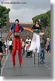 europe, italy, parade, people, rainbow, rome, stilts, vertical, walkers, photograph