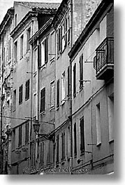 alghero, black and white, buildings, europe, italy, rows, sardinia, streets, vertical, photograph