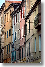 alghero, buildings, europe, italy, rows, sardinia, streets, vertical, photograph
