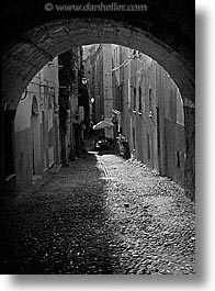 alghero, black and white, cobblestones, europe, italy, sardinia, streets, tunnel, vertical, photograph