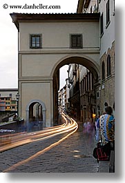 archways, cars, cobblestones, europe, florence, italy, light streaks, long exposure, motion blur, streets, tail lights, tunnel, tuscany, vertical, photograph