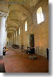 abbey, bricks, candles, churches, corridors, europe, italy, monestaries, religious, sant antimo, tuscany, vertical, windows, photograph