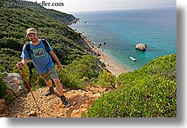 europe, hats, hiking, horizontal, isola giglio, italy, men, ocean, overlook, scenics, towns, tuscany, photograph