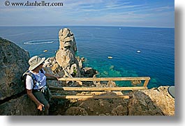 europe, hats, hiking, horizontal, isola giglio, italy, ocean, overlook, scenics, towns, tuscany, womens, photograph