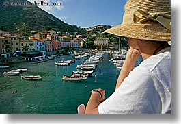 boats, europe, harbor, hats, horizontal, isola giglio, italy, ocean, towns, tuscany, womens, photograph