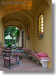 archways, bricks, chairs, europe, hotels, italy, la bandita, patio, towns, tuscany, vertical, villa, photograph