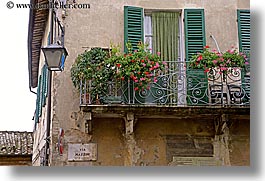 europe, flowers, horizontal, italy, montalcino, towns, tuscany, windows, photograph