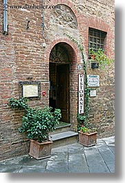 archways, bricks, doors, europe, italy, montalcino, plants, restaurants, stores, towns, tuscany, vertical, photograph