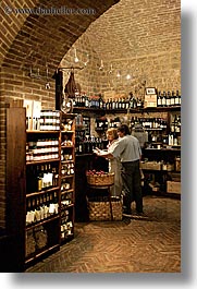 bottles, bricks, europe, italy, montalcino, stores, towns, tuscany, vertical, wines, photograph