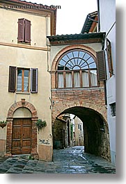 arches, archways, bricks, cobblestones, doors, europe, italy, montalcino, streets, towns, tuscany, vertical, windows, photograph