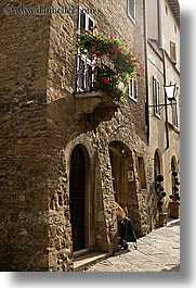 archways, balconies, europe, flowers, italy, pienza, plants, towns, tuscany, vertical, photograph