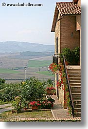 europe, flowers, houses, italy, pienza, plants, scenics, towns, tuscany, vertical, photograph