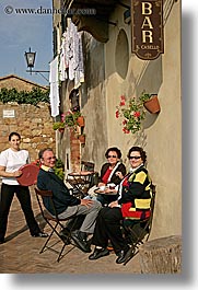 bars, cafes, europe, flowers, italy, local, people, pienza, plants, towns, tuscany, vertical, photograph