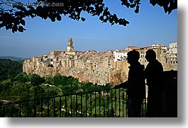 branches, cities, cityscapes, europe, horizontal, italy, leaves, men, old, pitigliano, silhouettes, towns, tuscany, photograph