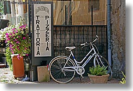 bicycles, europe, flowers, horizontal, italy, pitigliano, pizzeria, signs, towns, tuscany, photograph