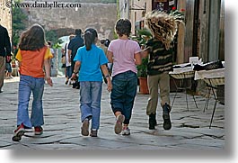 europe, girls, horizontal, italy, populonia, running, towns, tuscany, photograph