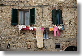 europe, hangings, horizontal, italy, laundry, san quirico, stones, towns, tuscany, photograph