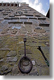 europe, holders, irons, italy, scarperia, stones, torch, towns, tuscany, vertical, photograph