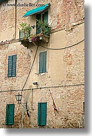 balconies, europe, italy, plants, siena, towns, tuscany, vertical, windows, photograph