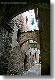 archways, bricks, cobblestones, europe, italy, narrow streets, siena, streets, towns, tuscany, vertical, photograph