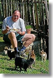 cats, dale, eating, europe, glasses, italy, men, people, steve, tourists, tuscany, vertical, photograph