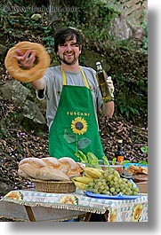 apron, bread, europe, foods, happy, italy, leaders, men, picnic, roberto, tourists, tuscany, twirling, vertical, photograph