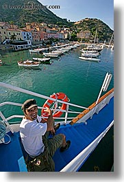 europe, happy, harbor, italy, leaders, men, pointing, tourists, tuscany, vertical, william, photograph