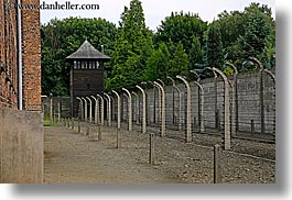 auschwitz, barbed, barbed wire, buildings, europe, fences, guard tower, horizontal, poland, prison, prison camp, structures, towers, wires, photograph