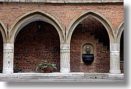 archways, bricks, europe, flowers, gothic, horizontal, jagiellonian university, krakow, materials, poland, red, structures, style, photograph