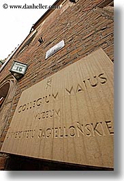 bricks, europe, gothic, jagiellonian university, krakow, materials, perspective, poland, signs, style, university, upview, vertical, photograph