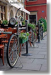 bicycles, cafes, europe, krakow, poland, transportation, vertical, photograph