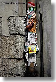 europe, fliers, krakow, pipes, poland, torn, vertical, photograph