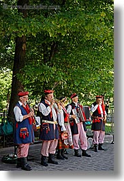 bands, europe, krakow, men, people, poland, polka, vertical, photograph