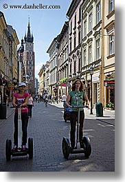 europe, krakow, people, poland, segways, transportation, vertical, womens, photograph