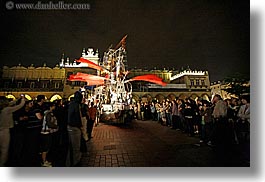 crowds, europe, horizontal, krakow, nite, people, performance, poland, red, ships, winged, photograph
