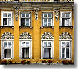 colorful, colors, europe, flowers, horizontal, krakow, oranges, poland, walls, windows, yellow, photograph
