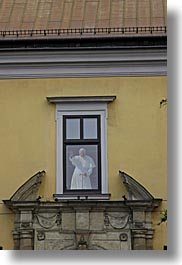 christian, colors, europe, from, krakow, poland, popes, religious, vertical, waving, windows, yellow, photograph