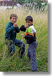 boys, childrens, colors, europe, green, gypsies, people, slovakia, vertical, photograph