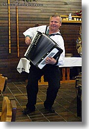 accordion, artists, clothes, dancing, emotions, europe, hats, instruments, music, musicians, people, players, slovakia, slovakian dance, smiles, vertical, photograph