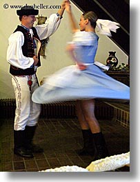 activities, clothes, couples, dance, dancing, europe, folks, hats, music, people, slovak, slovakia, slovakian dance, vertical, photograph
