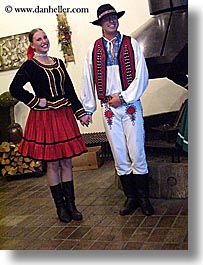 activities, clothes, couples, dance, dancing, emotions, europe, folks, hats, music, people, slovak, slovakia, slovakian dance, smiles, vertical, photograph