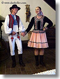 activities, clothes, couples, dance, dancing, emotions, europe, folks, hats, music, people, slovak, slovakia, slovakian dance, smiles, vertical, photograph