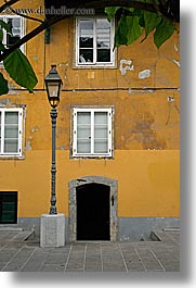 doors, europe, lamp posts, ljubljana, slovenia, vertical, windows, photograph