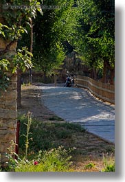 ansovell, europe, fences, motorcycles, picket, spain, vertical, photograph
