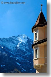 buildings, eiger, europe, grindelwald, mountains, nature, snowcaps, switzerland, vertical, photograph