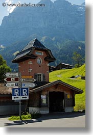 europe, grindelwald, houses, humor, signs, switzerland, vertical, photograph